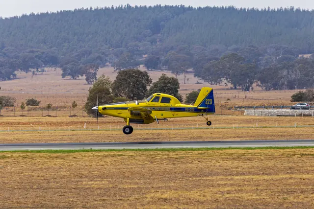 Fred Fahey Aerial Services (VH-CVF) Air Tractor AT-802 landing at Canberra Airport (1).