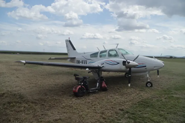 Overview of Beechcraft Baron OM-KVV at Kolín Airport in Pašinka, Kolín District.