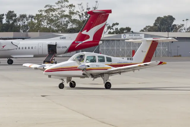 Clamback & Hennessy Flying Training School (VH-WEU) Beechcraft Duchess taxiing at Wagga Wagga Airport (1).