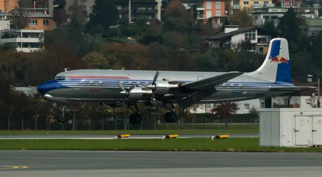 Douglas DC-6 landing at Innsbruck.