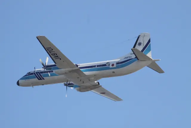 Japan Coast Guard YS-11 JA8701 in flight at Osaka Kansai.