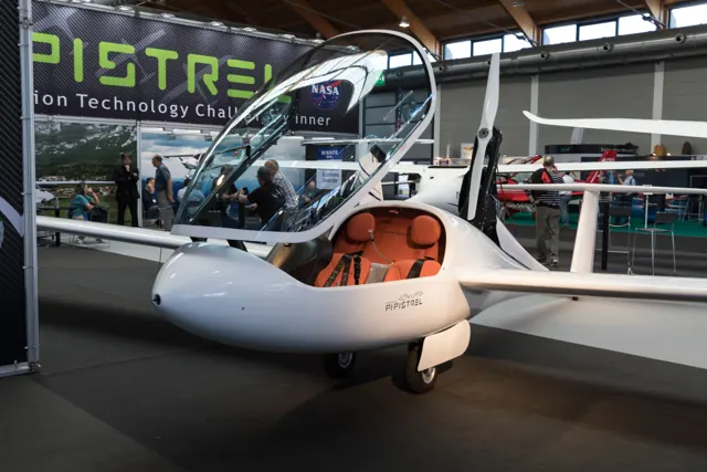 Pipistrel Taurus on display at AERO Friedrichshafen 2018, with its cockpit open.