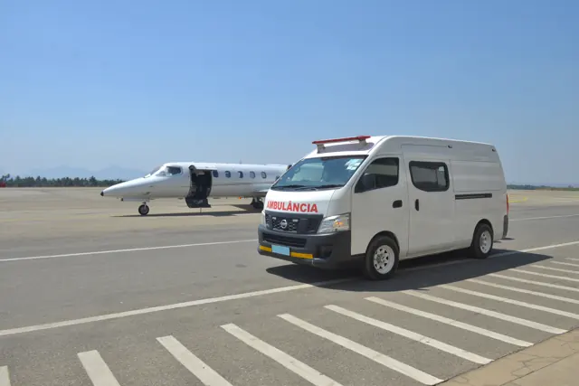 A Learjet 35 beside a ground ambulance, illustrating the family’s medical transport role.