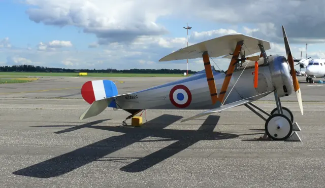 A Nieuport 24 replica displayed outside the Stampe Museum; modern reproductions can differ from wartime aircraft.