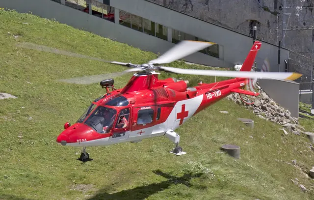 Agusta A109 K2 of the Rega over Mount Pilatus
