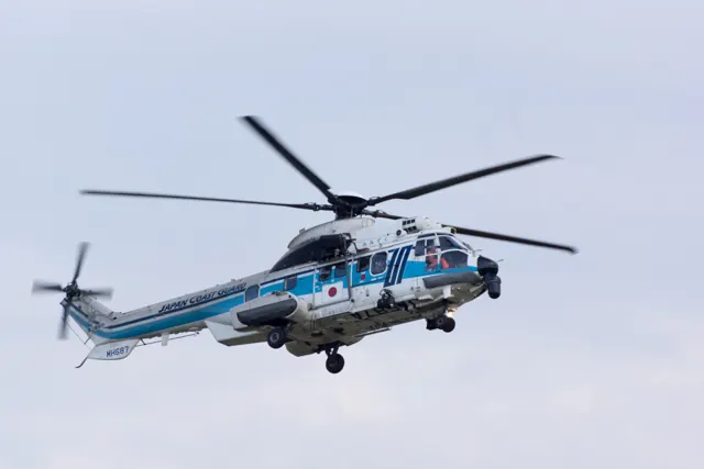 A Japan Coast Guard H225 in flight, Kansai Airport Coast Guard Air Station , 2015