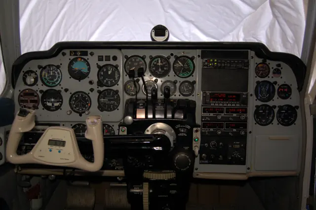 Cockpit of a 1964 Baron 55 with a mixture of original equipment and modern avionics