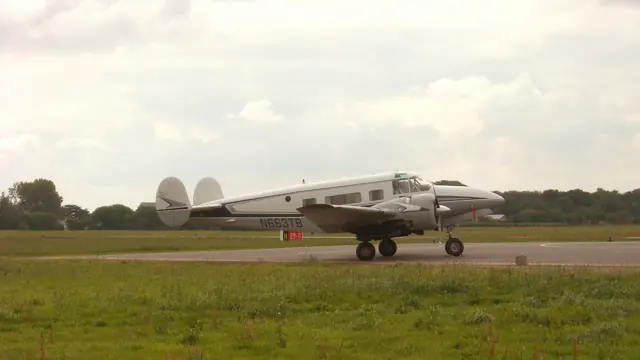 Private Beech H18 with the optional tricycle undercarriage visiting Lannion , France