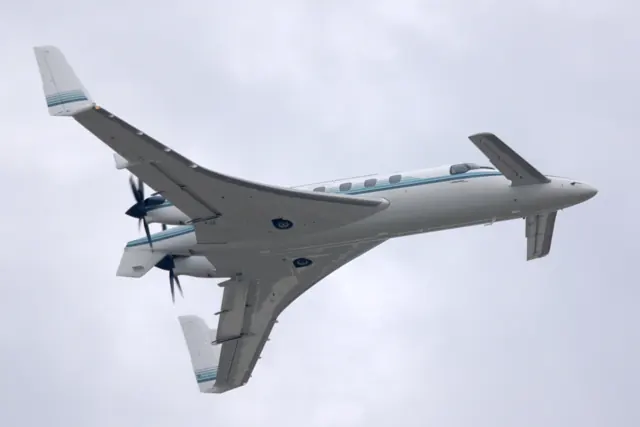 The Starship's unusual design features variable sweep canards and pusher propellers.