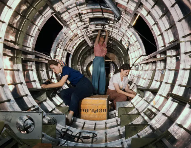 Installation of fixtures and assemblies on a tail fuselage section of a B-17 at the Douglas plant in Long Beach, California , October 1942