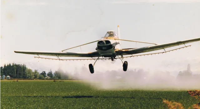 Cessna 188 AGWagon spraying at Canterbury, New Zealand , 1979