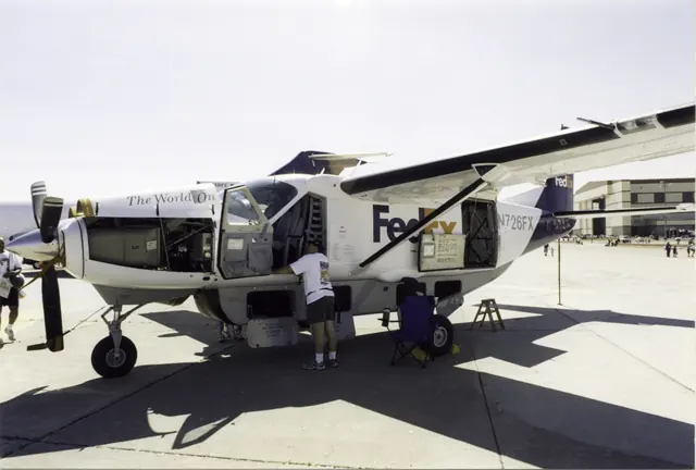A FedEx Super Cargomaster with cargo pod. The Cargomaster and Super Cargomaster variants are built without cabin windows.