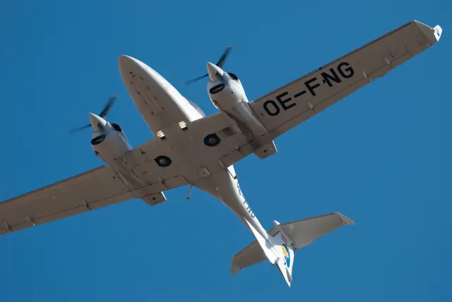 Underside of a DA42 passing overhead