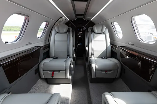 Club seating with recessed aisle