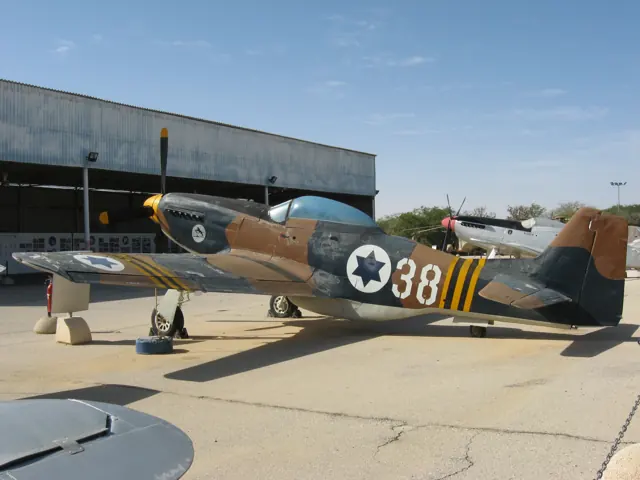 A P-51D at the Israeli Air Force Museum : The marking beneath the cockpit notes its participation in the wire-cutting operation at the onset of the Suez Crisis.