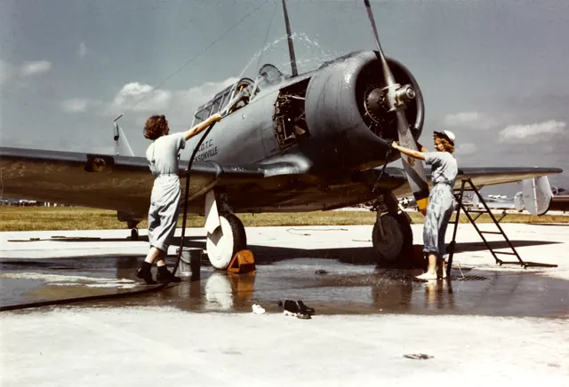WAVES washing an SNJ at NAS Jacksonville , Florida, USA